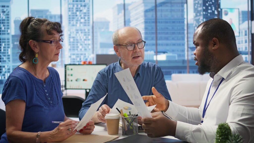 Medicare Annual Review: What Denver Seniors Should Check Before Renewing Their Plan | Aspen Financial & Insurance in Fort Collins, CO | Annuities in CO | Life insurance in CO Senior couple discussing pension and financial strategy with a professional broker.