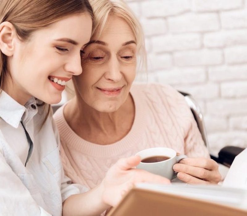Two women enjoying coffee together.
